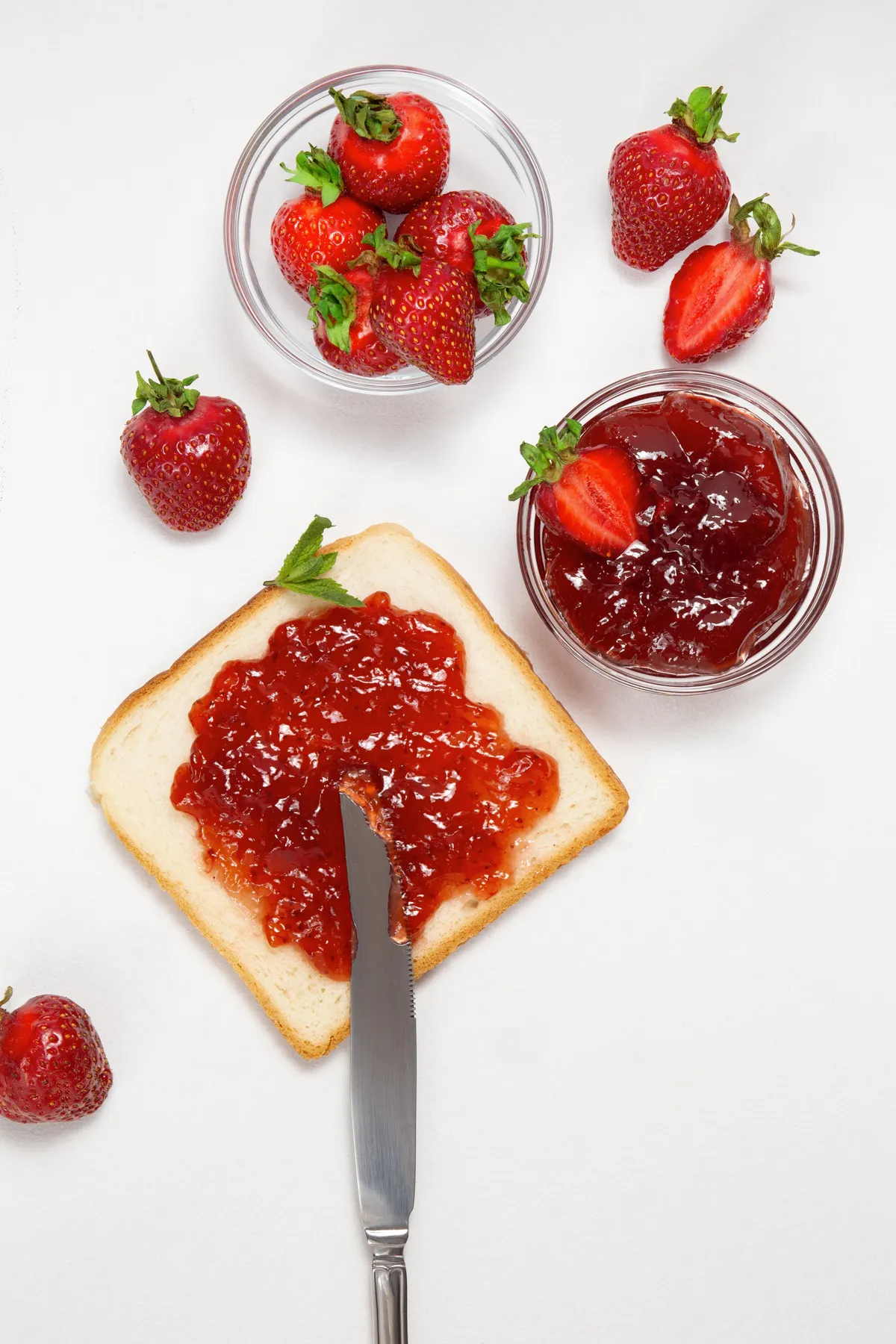 Top,View,Of,Strawberry,Jam,Spread,On,Toast,,Surrounded,By