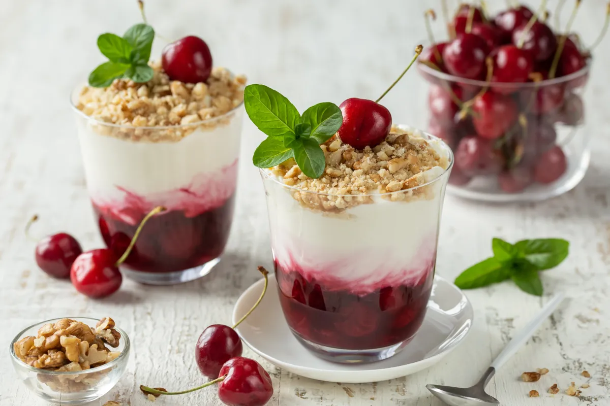 Cherry,Cream,Trifle,Dessert,In,Glass,,White,Background