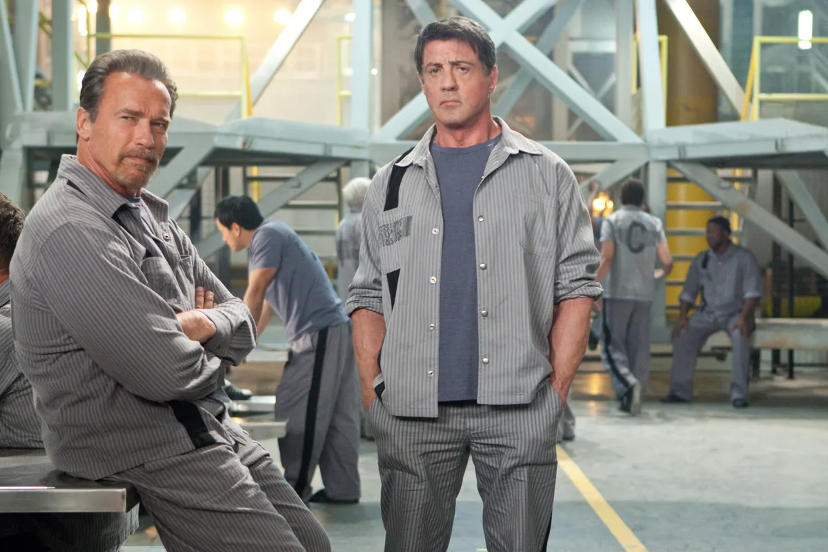 SYLVESTER STALLONE  and ARNOLD SCHWARZENEGGER  in ESCAPE PLAN (2013).
