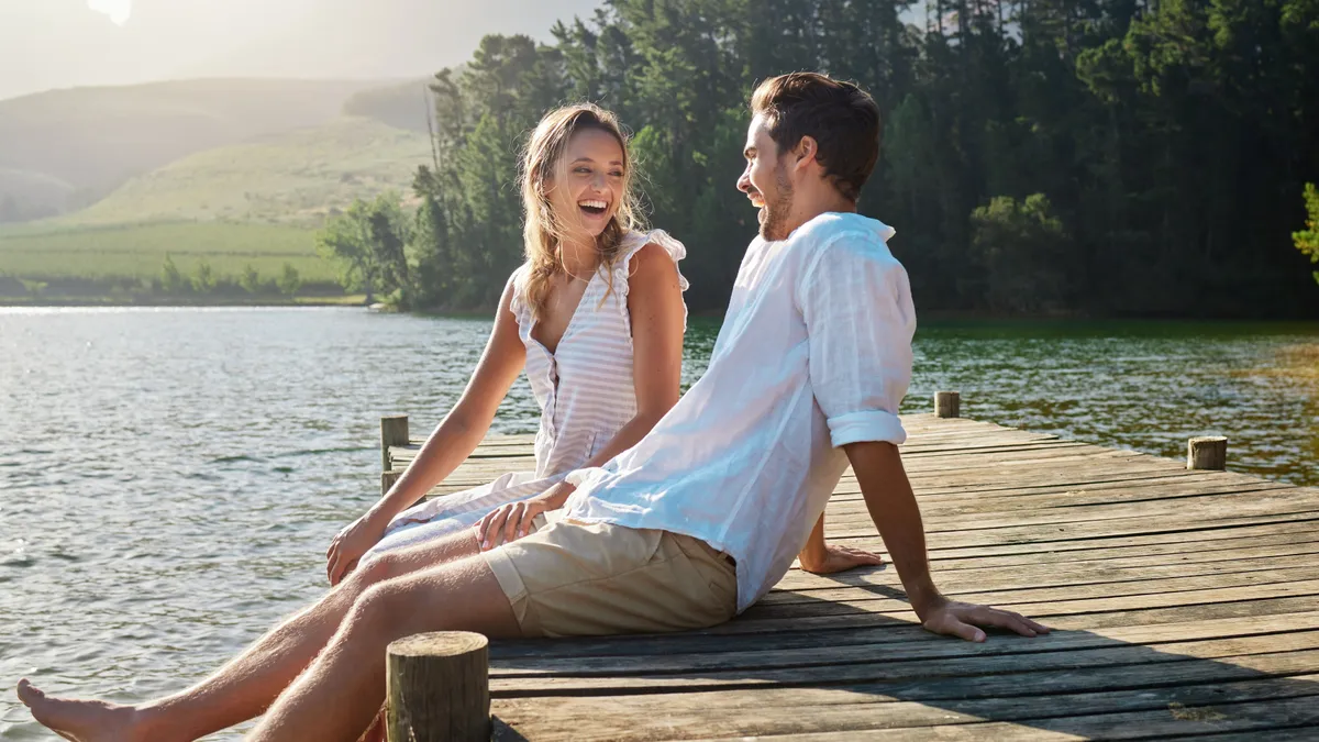 Love,,Laugh,And,Pier,With,Couple,At,Lake,For,Bonding,