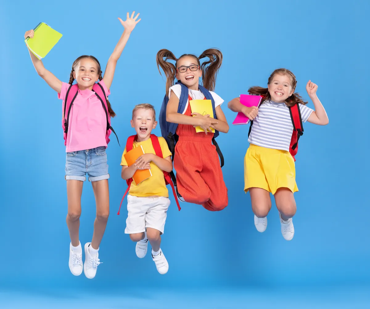 Cheerful schoolkids  having fun