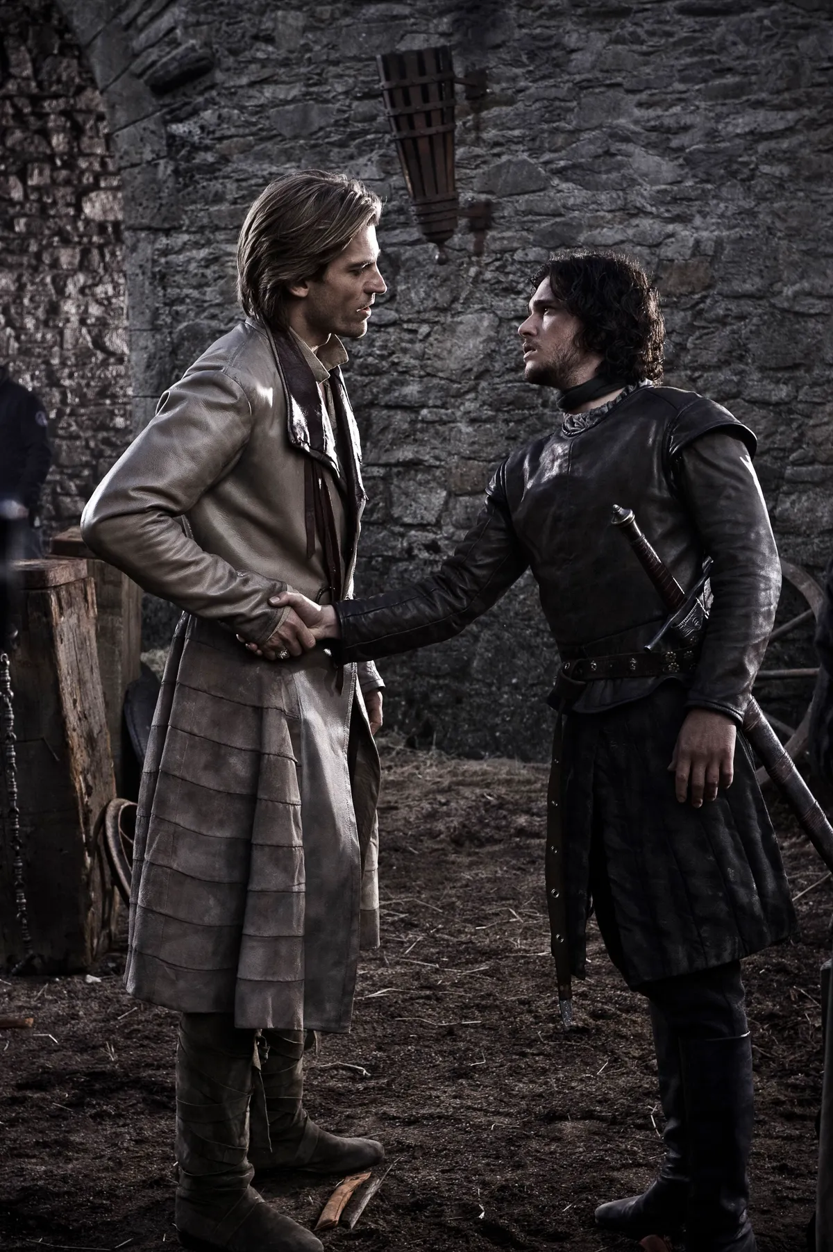 NIKOLAJ COSTER-WALDAU  and KIT HARINGTON  in GAME OF THRONES (2011).
