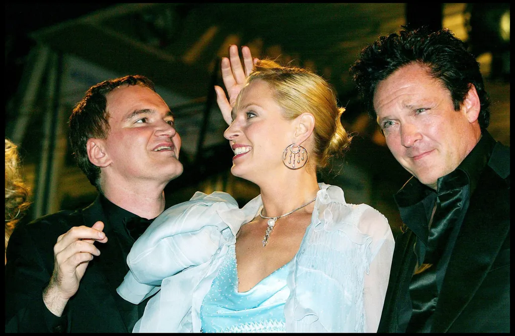 "QUENTIN TARANTINO" "UMA THURMAN" "MICHAEL MADSEN" SORTIE DE LA PROJECTION DU FILM "KILL BILL VOL 2" AU 57EME FESTIVAL DU FILM CANNES 2004 "PLAN SERRE" FEMININ HOMME ACTEUR ACTRICE REALISATEUR MECHES DE CHEVEUX