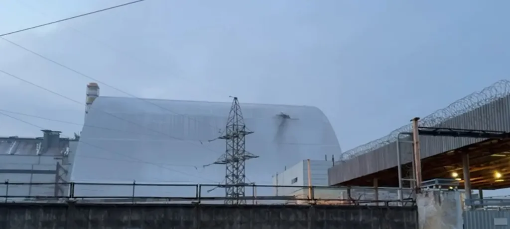 **VIDEO AVAILABLE: CONTACT INFO@COVERMG.COM TO RECEIVE**..A Russian drone attack struck the sarcophagus or radiation shelter covering the damaged reactor at the Chernobyl nuclear power plant on Friday (14February2025)...The strike hit the shelter of the p