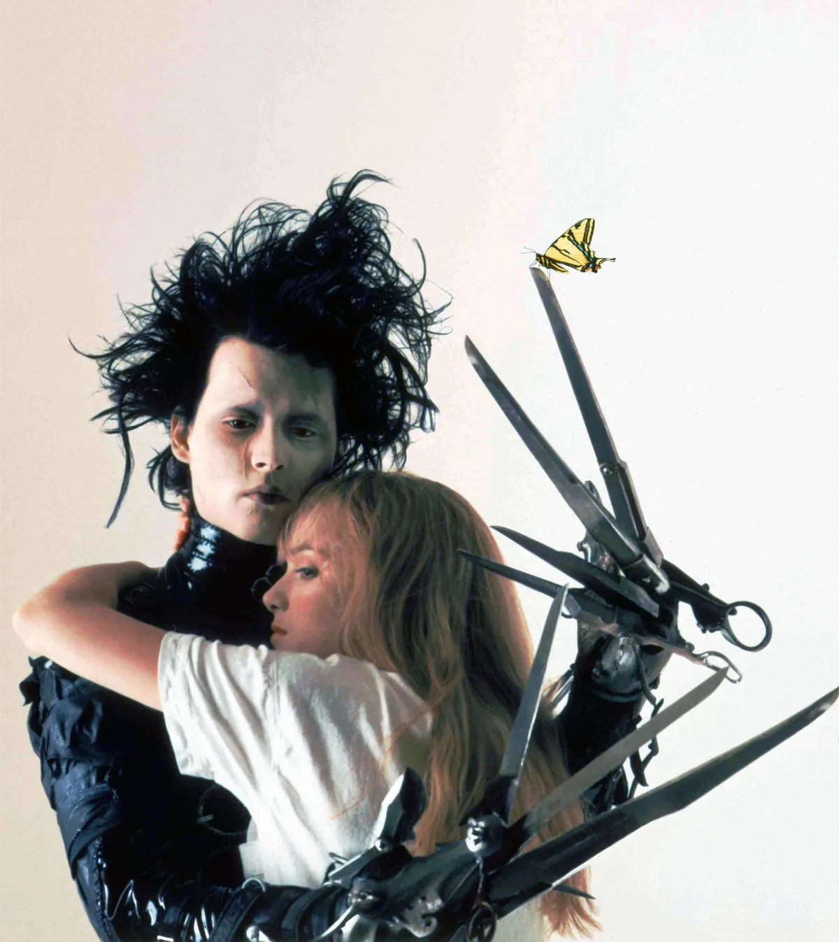 WINONA RYDER  and JOHNNY DEPP  in EDWARD SCISSORHANDS (1990).