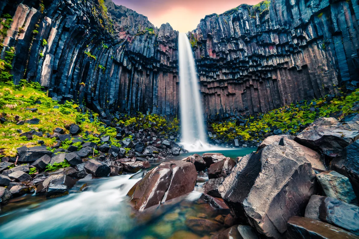 Dramatic,Morning,View,Of,Famous,Svartifoss,(black,Fall),Waterfall.,Colorful