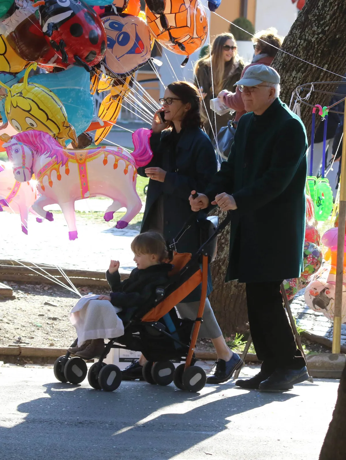 EXCLUSIVE: Steve Martin seen strolling at the park of Villa Borghese in Rome with wife Anne and daughter