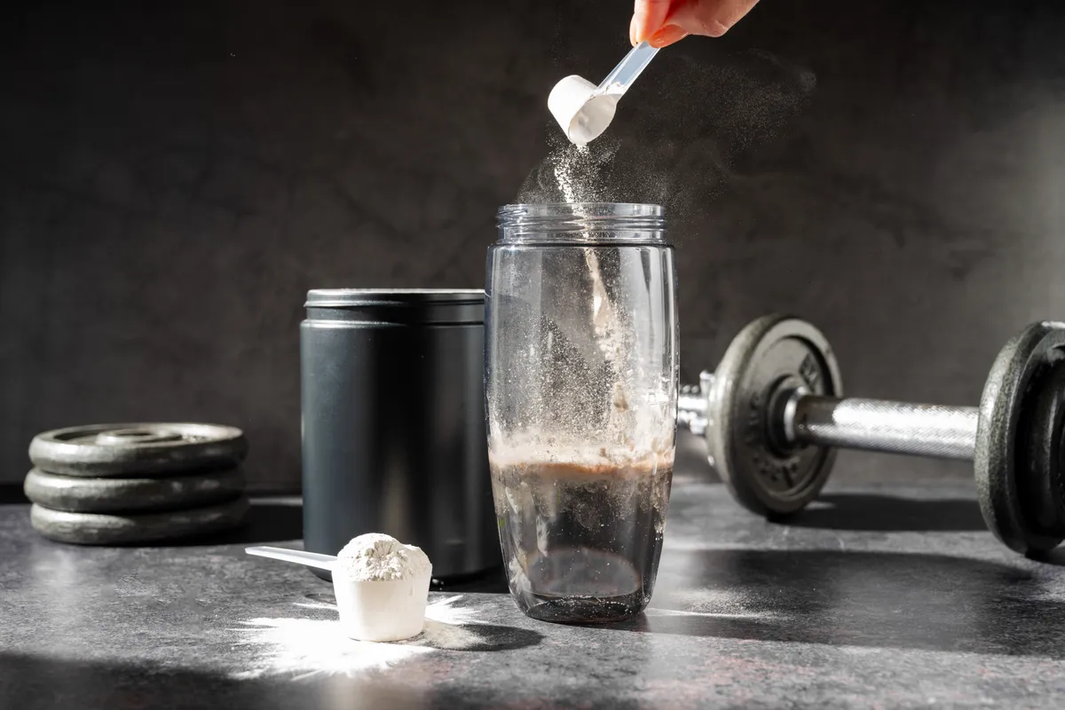Amino,Acid,Food,Supplement,,Creatine,Powder,In,A,Measuring,Scoop,