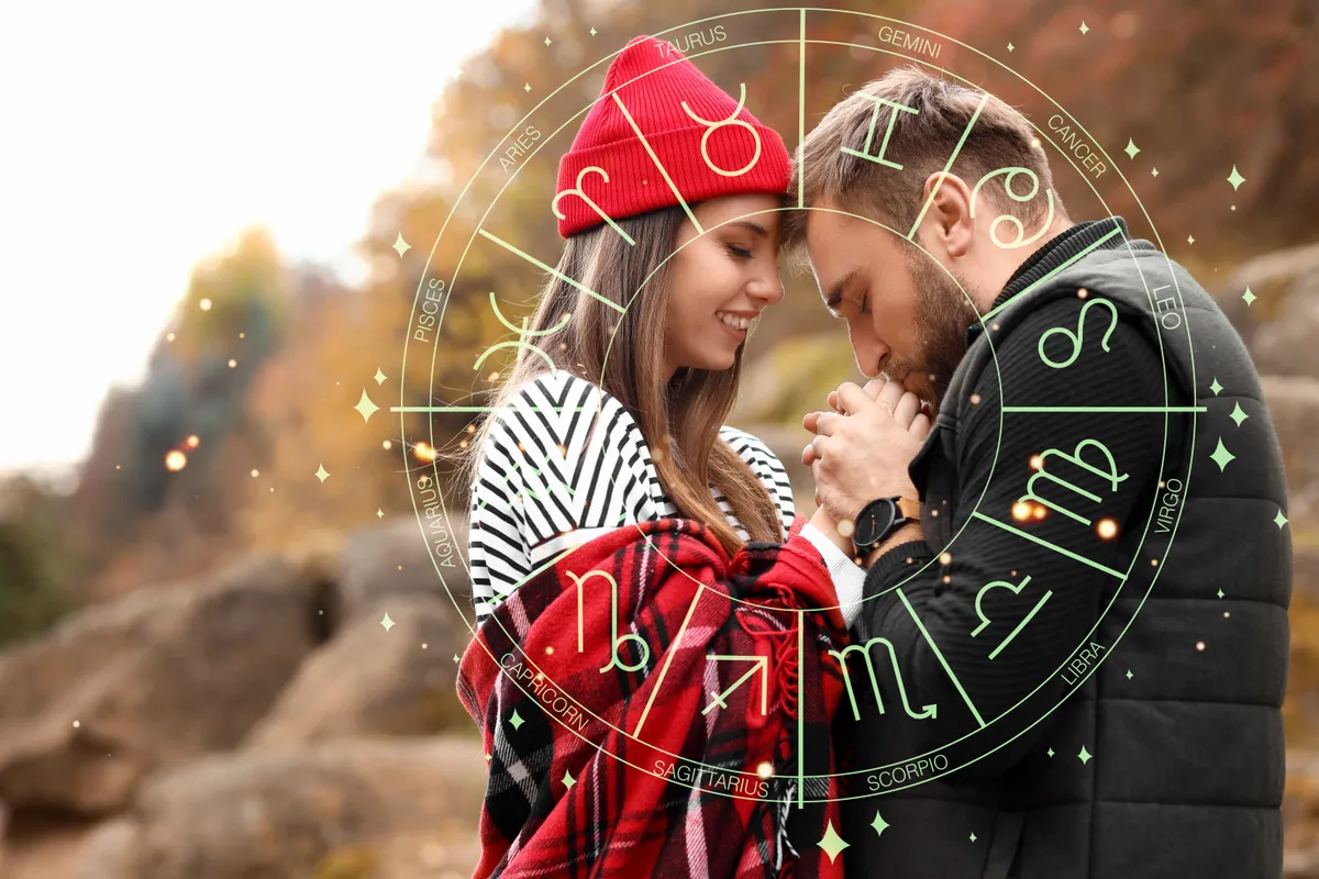 Young,Man,Kissing,His,Girlfriend's,Hands,In,Beautiful,Autumn,Park.