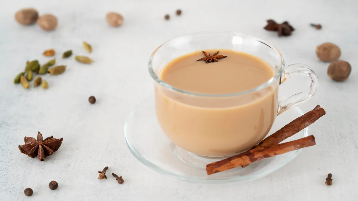 Masala,Tea,Chai,In,A,Glass,Cup,With,Ingredients,For