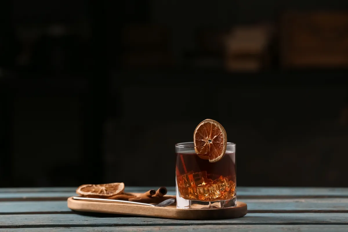 Board,With,Glass,Of,Delicious,Old,Fashioned,Cocktail,,Cinnamon,Sticks