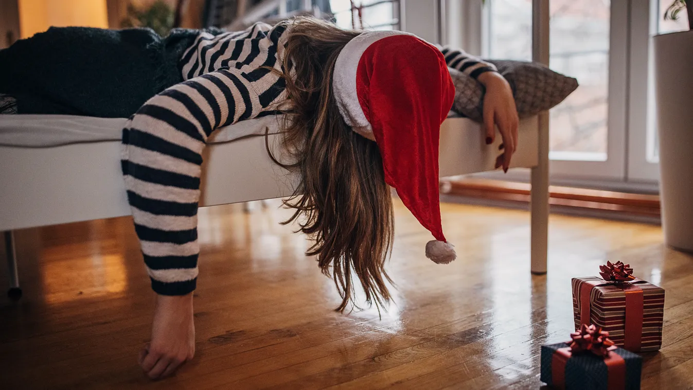 Másnapossággal küzdő nő