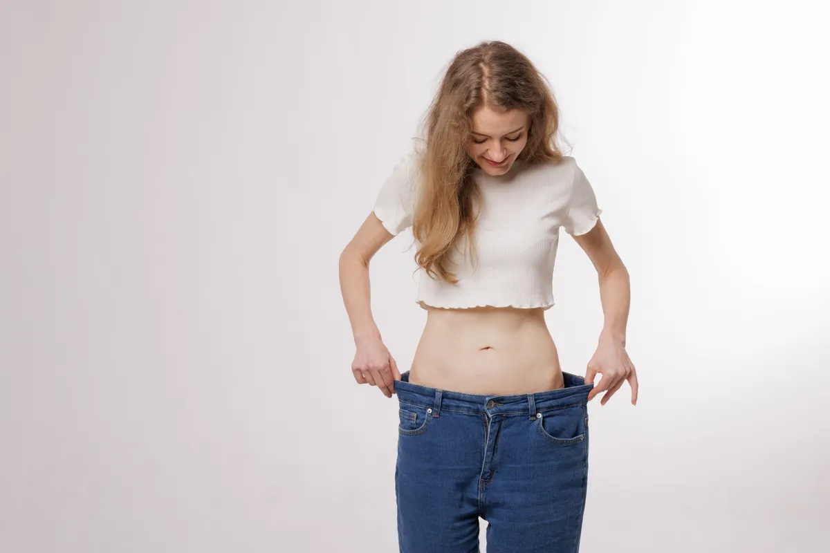 Zsírégető programot végigcsináló karcsúsodott nő