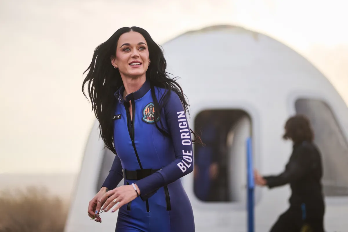Katy Perry Comes Back To Earth After Singing On Space Trip