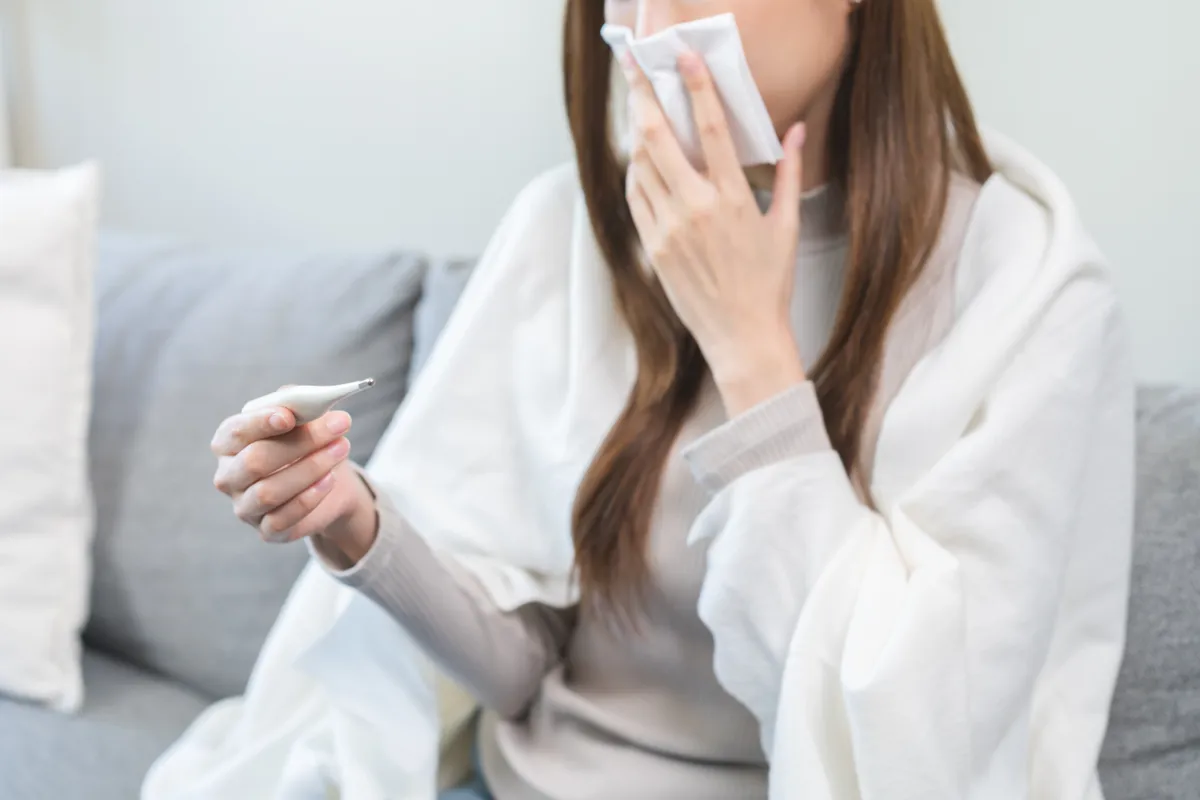 Sick,,Influenza,Asian,Young,Woman,Tired,Have,A,Fever,And