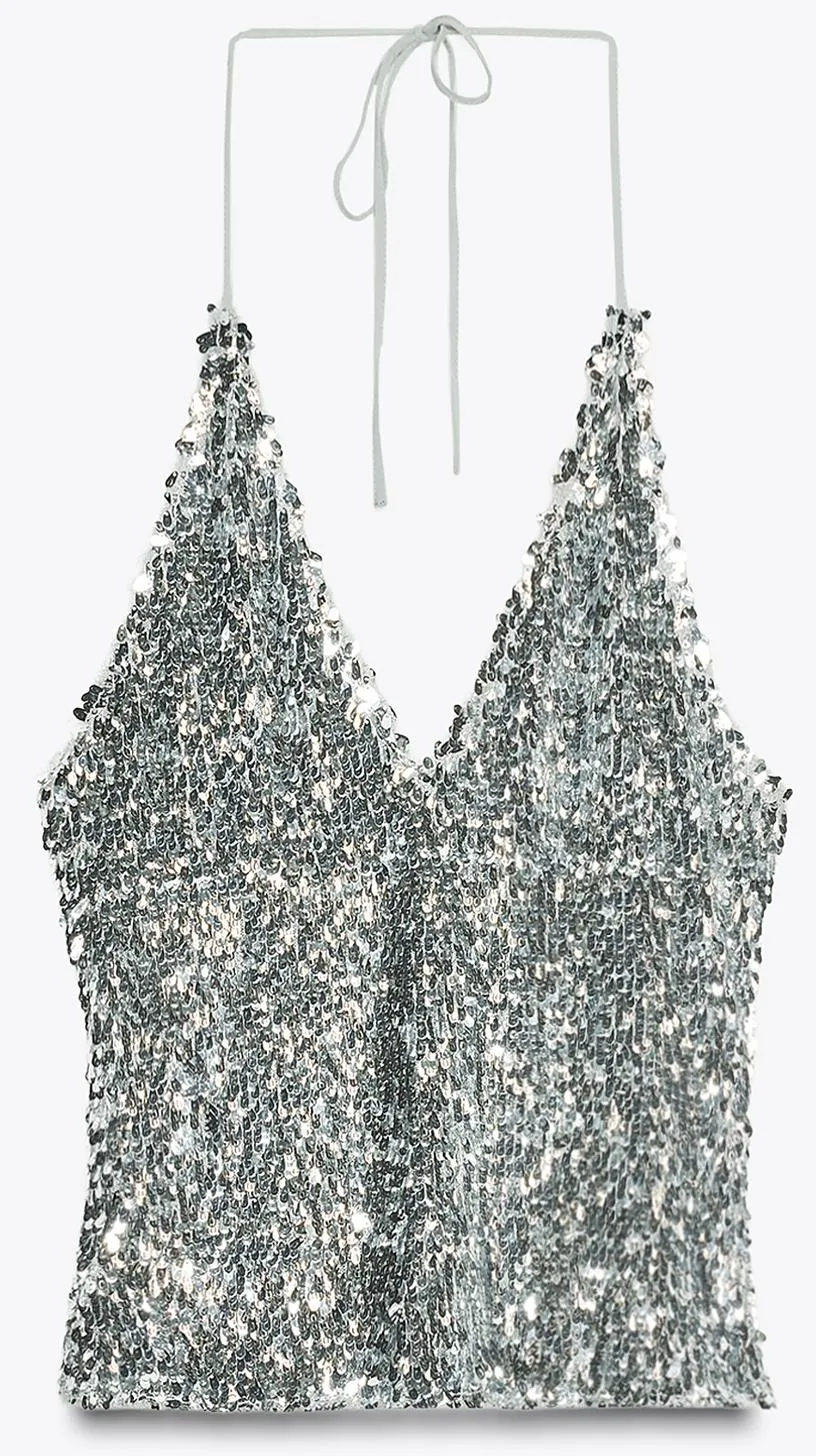 Karácsonyi divat: nyakbakötős flitteres top.