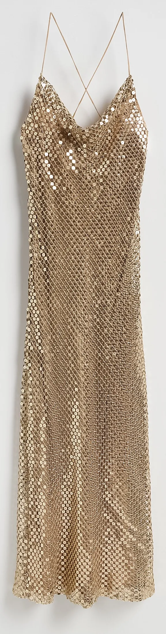 Női divat 50 felett: arany maxiruha.