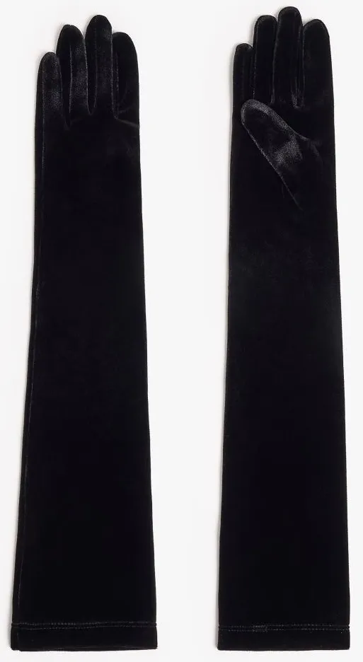 Karácsonyi divat: fekete bársony kesztyű.