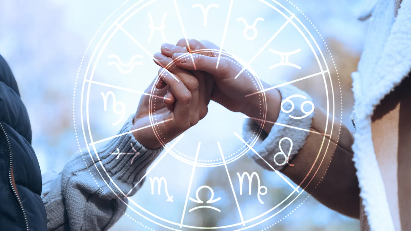 Egymás kezét fogó pár a horoszkópban.