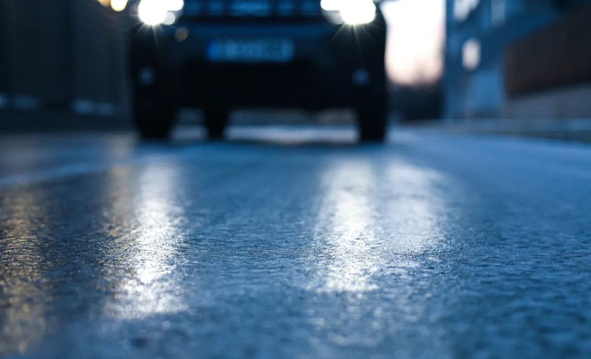 Glazed,Frost,On,The,Asphalt.,Icy,Road,Danger,For,Driving.