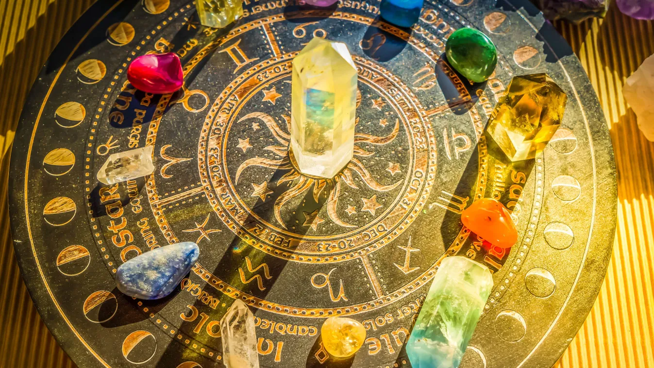 Színes kristályok egy ezoterikus táblán a személyiségtesztben.