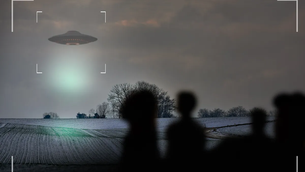 Ufo,,Alien,And,Camcorder,On,A,Camera,Display,To,Record