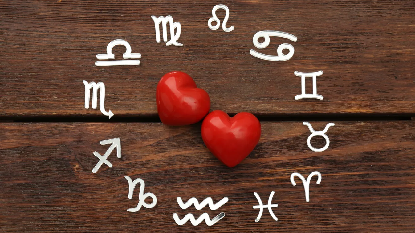 A horoszkóp csillagjegyei egy körben két szív körül