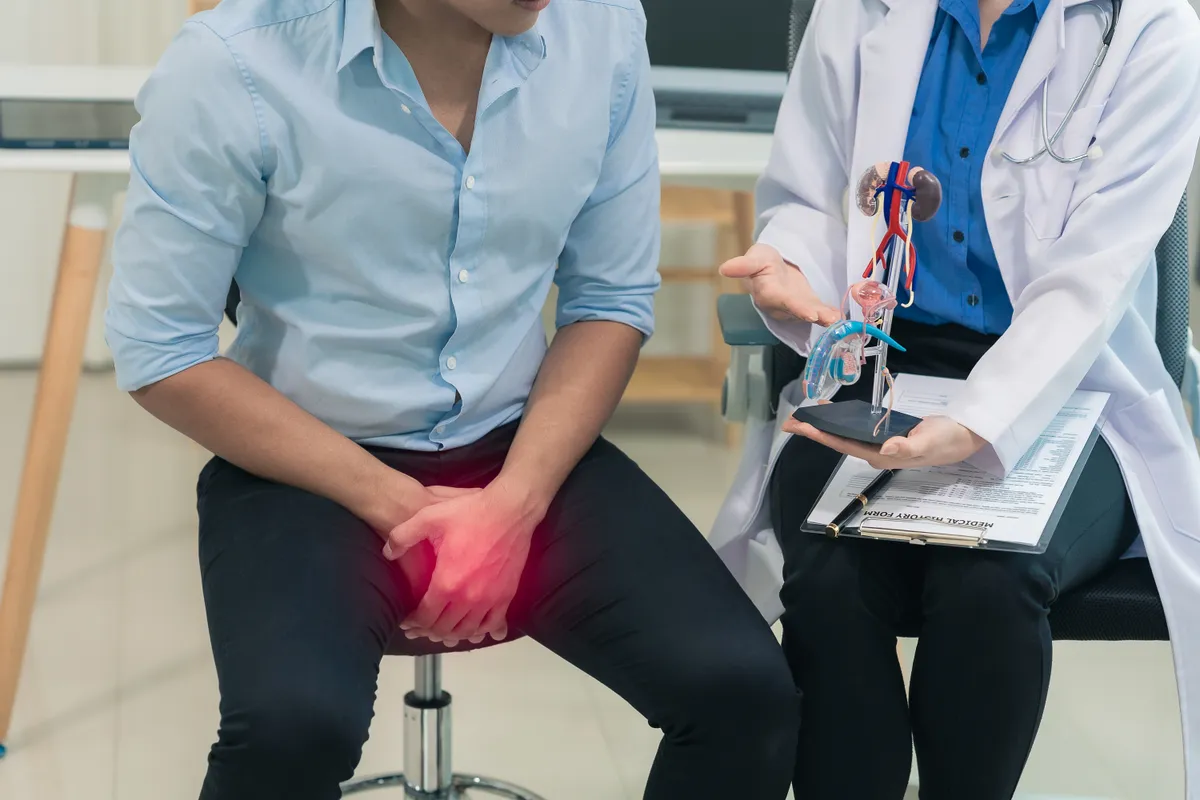 Young,Man,Consulting,With,Doctor,About,Causes,Of,Erectile,Dysfunction