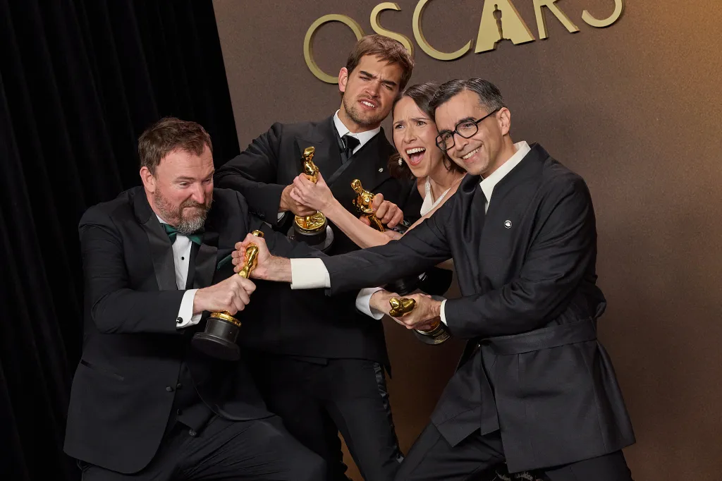 Jack Piatt, Sam A. Davis, Natalie Musteata and Alexandre Singh pose backstage with the Oscar for Live Action Short Film during the 98th Oscars® at Dolby Theatre at Ovation Hollywood on Sunday.