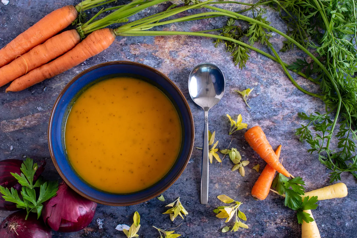 Top,View,Of,A,Bowl,Of,Carrot,And,Coriander,Soup