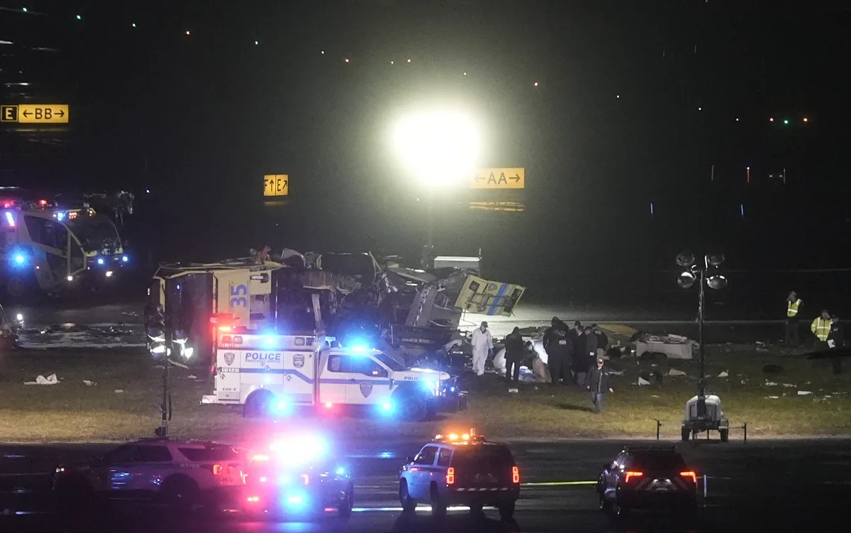Air Canada plane collides with fire truck at LaGuardia, killing 2, injuring others