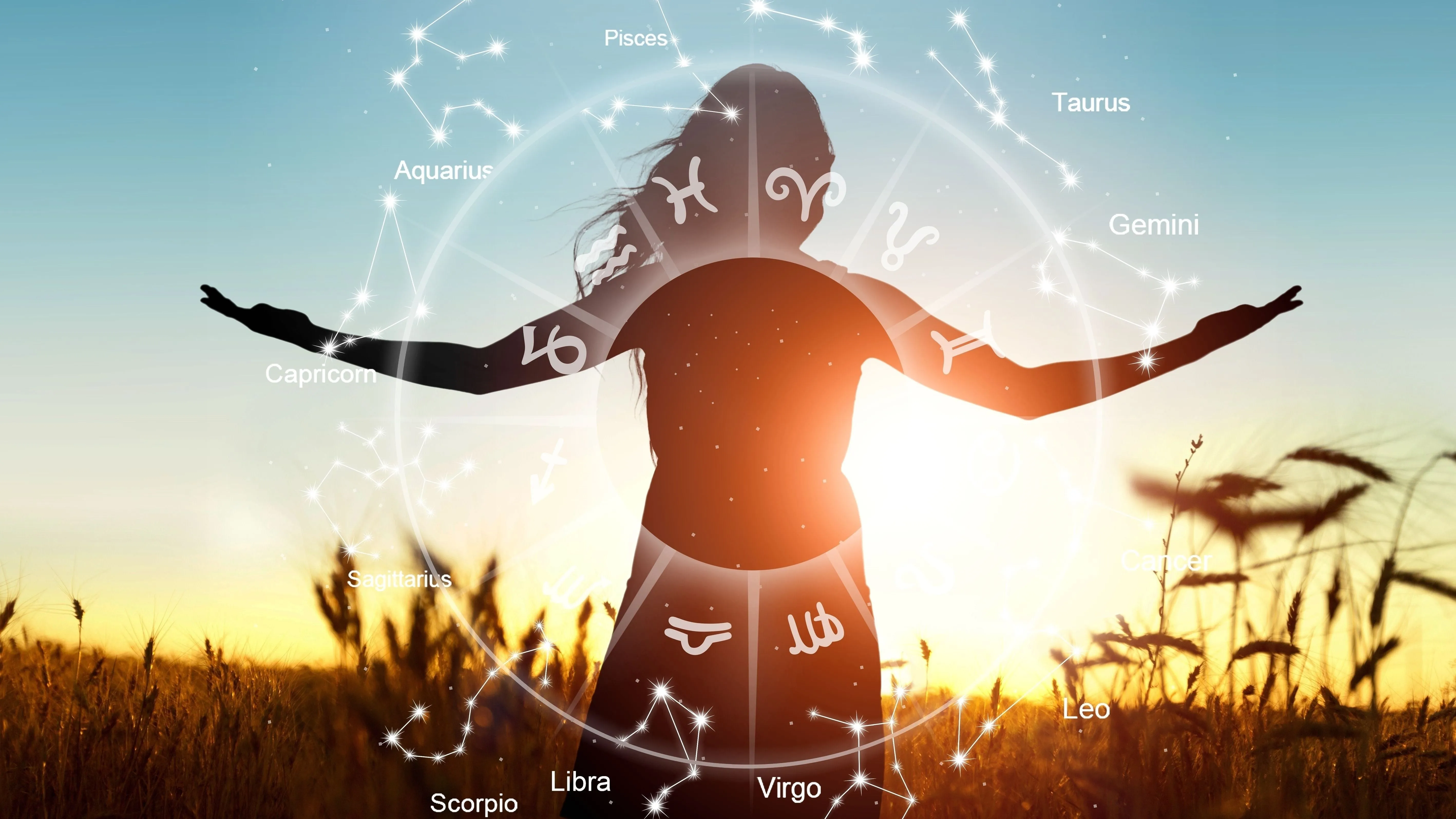 Horoszkópban használt zodiákus kör egy nő sziluettjén a napsütésben