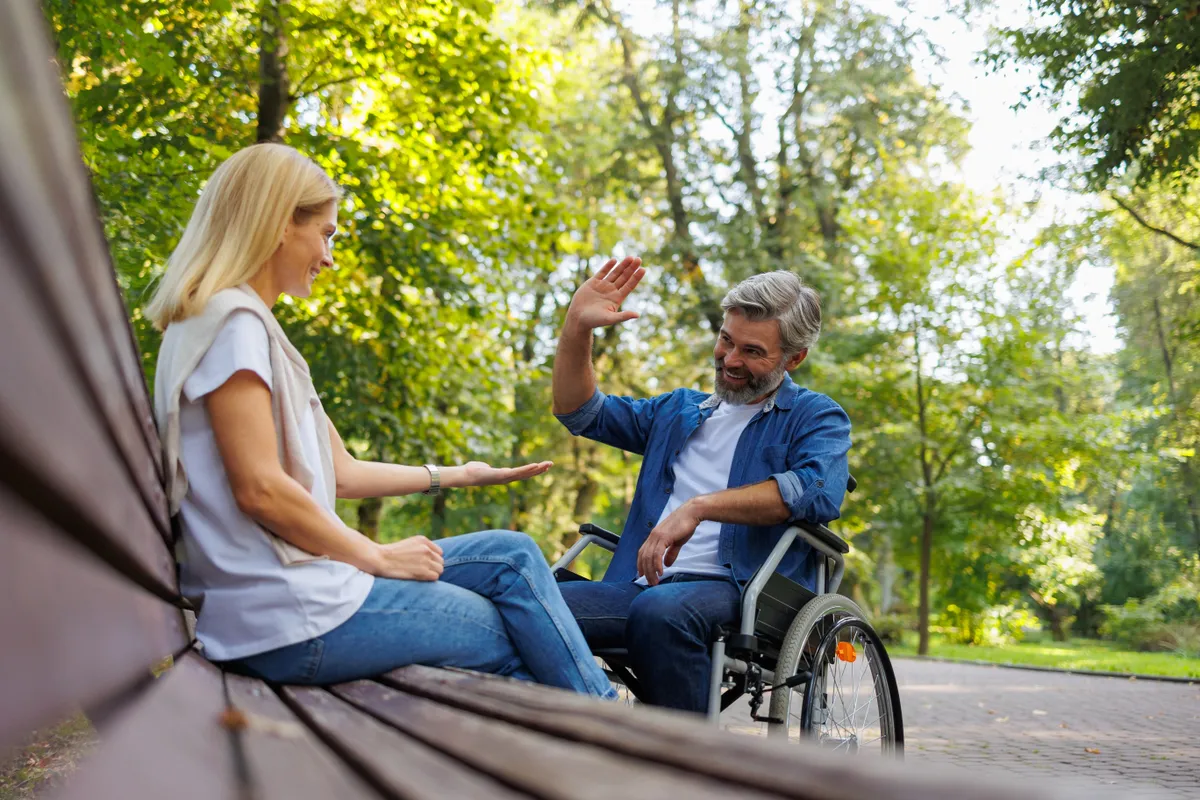 Friendship,Knows,No,Bounds:,Woman,Cheers,Man,In,Wheelchair