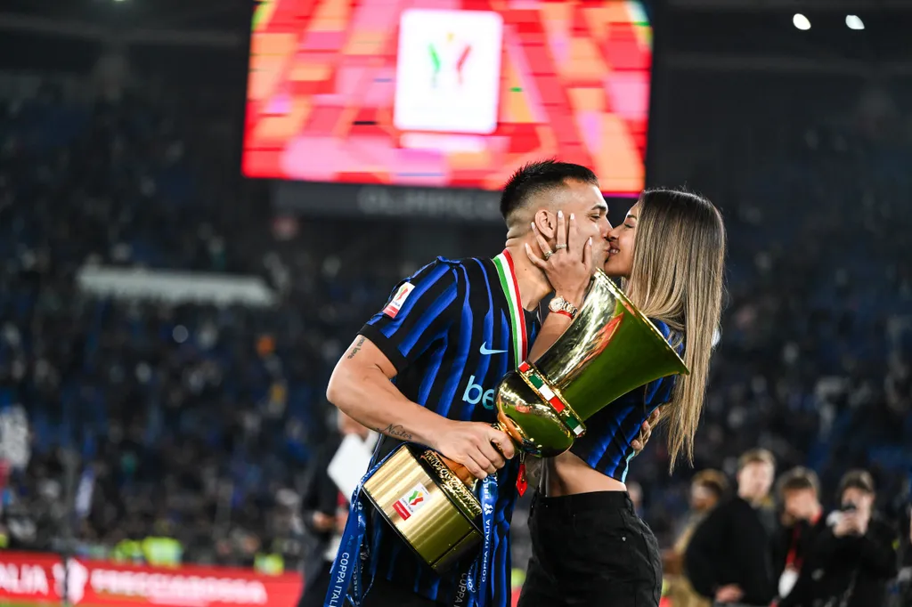 IPA84657483 - Lautaro Martinez of Inter FC and Agustina Gandolfo celebrate after winning the Coppa Italia Final football match between SS Lazio and Inter FC Internazionale on 13 of May 2026 at Stadio Olimpico stadium in Roma, Italy. Photo Tiziano Ballabio