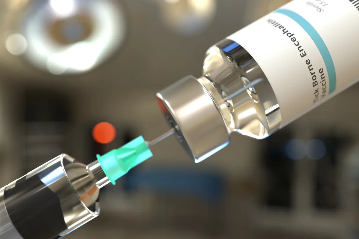 Vial with tick-borne encephalitis TBE vaccine and syringe for injection. 3D rendering